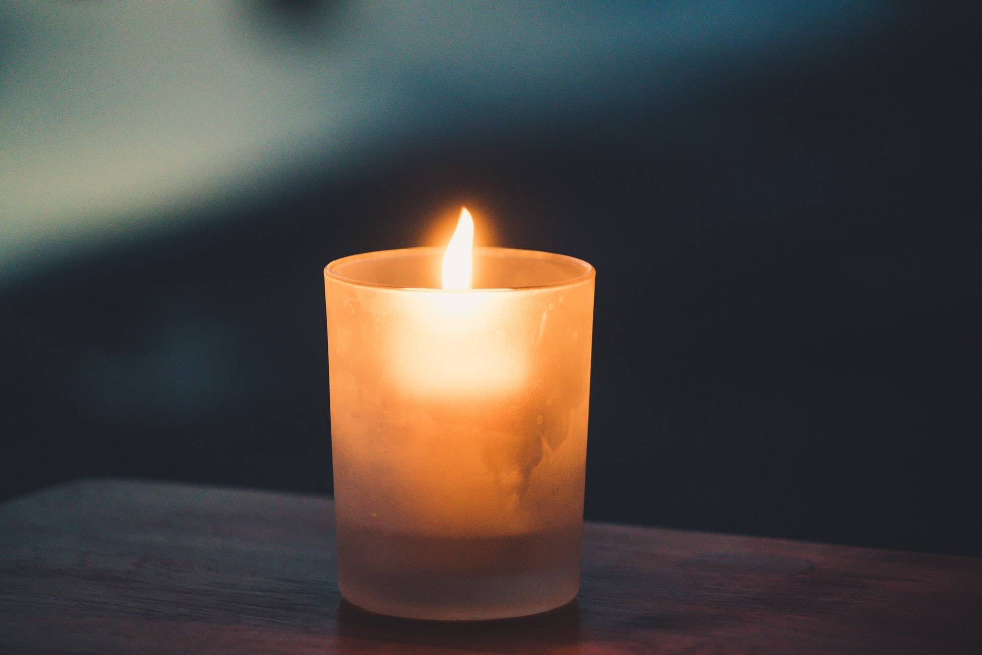Candle burning in the dark - Darren Yaw